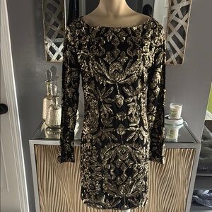 Nicole Miller Elegant Black and Gold Embellished Dress